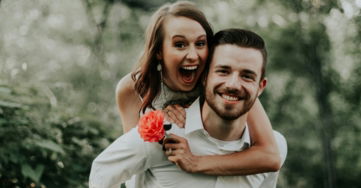 woman-riding-on-back-of-man.jpg woman riding on back of man